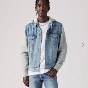Levi's Light Blue Denim Jacket with Gray Sleeves. runs small Sz M